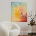 abstraktní žluto-červeno-modrý obraz pověšený nad křeslem