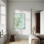 světle modrý abstraktní obraz pověšený na zdi v interiéru