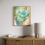 barevný abstraktní obraz nad komodou