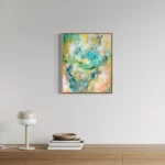 barevný abstraktní obraz nad nábytkem